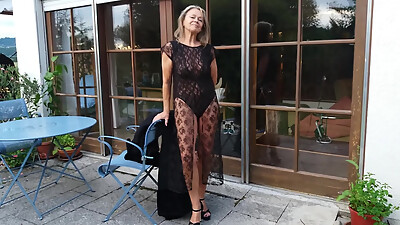 A Mature Woman Shows off Her Figure Outside in a Lace Bodysuit!