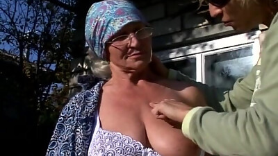 Hairy grandma is getting banged outdoors
